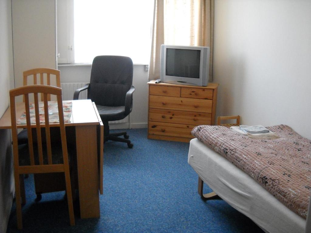 TV a/nebo společenská místnost v ubytování Hotel Gedser Apartments
