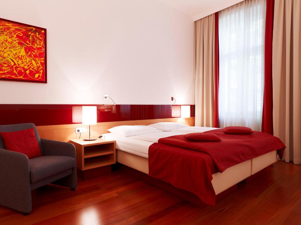 Llit o llits en una habitació de Hotel Zipser