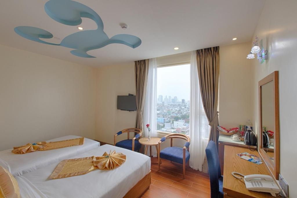 Phòng Deluxe 2 Giường Đơn Nhìn ra Một góc Biển