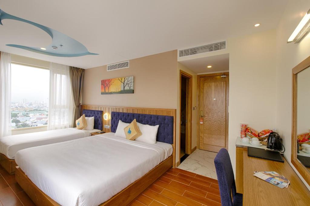 Phòng Deluxe Gia Đình Nhìn Ra Một Phía Biển
