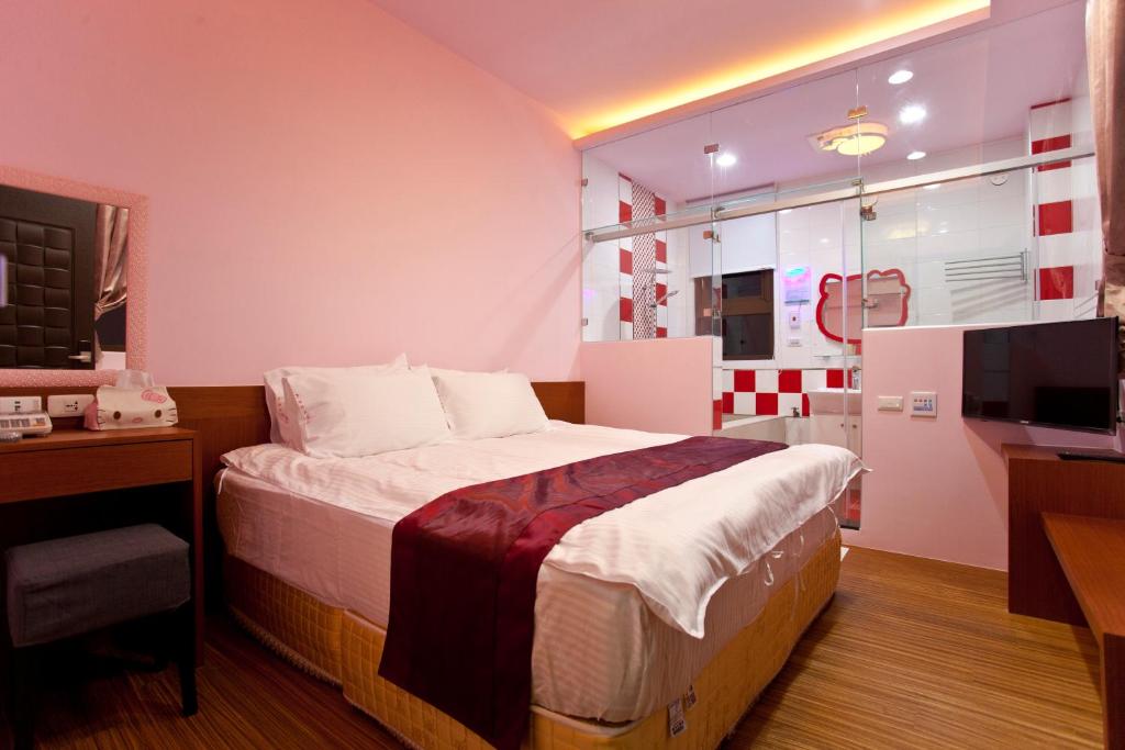 Postel nebo postele na pokoji v ubytování Sin Ging Hong Resort