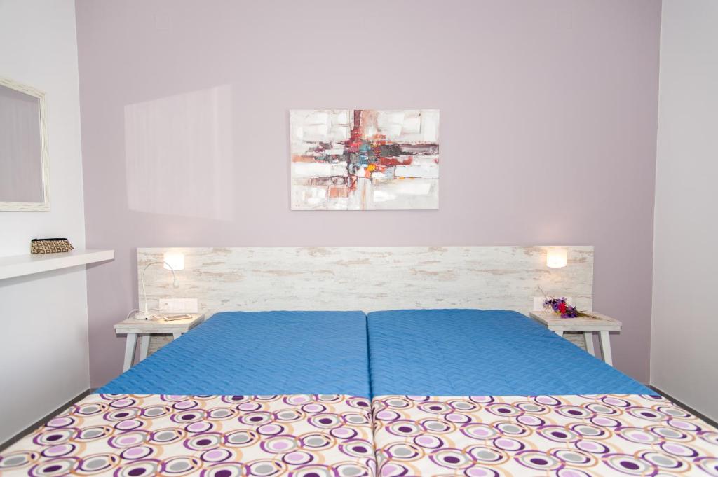 Łóżko lub łóżka w pokoju w obiekcie Efrilias Studios & Apartments