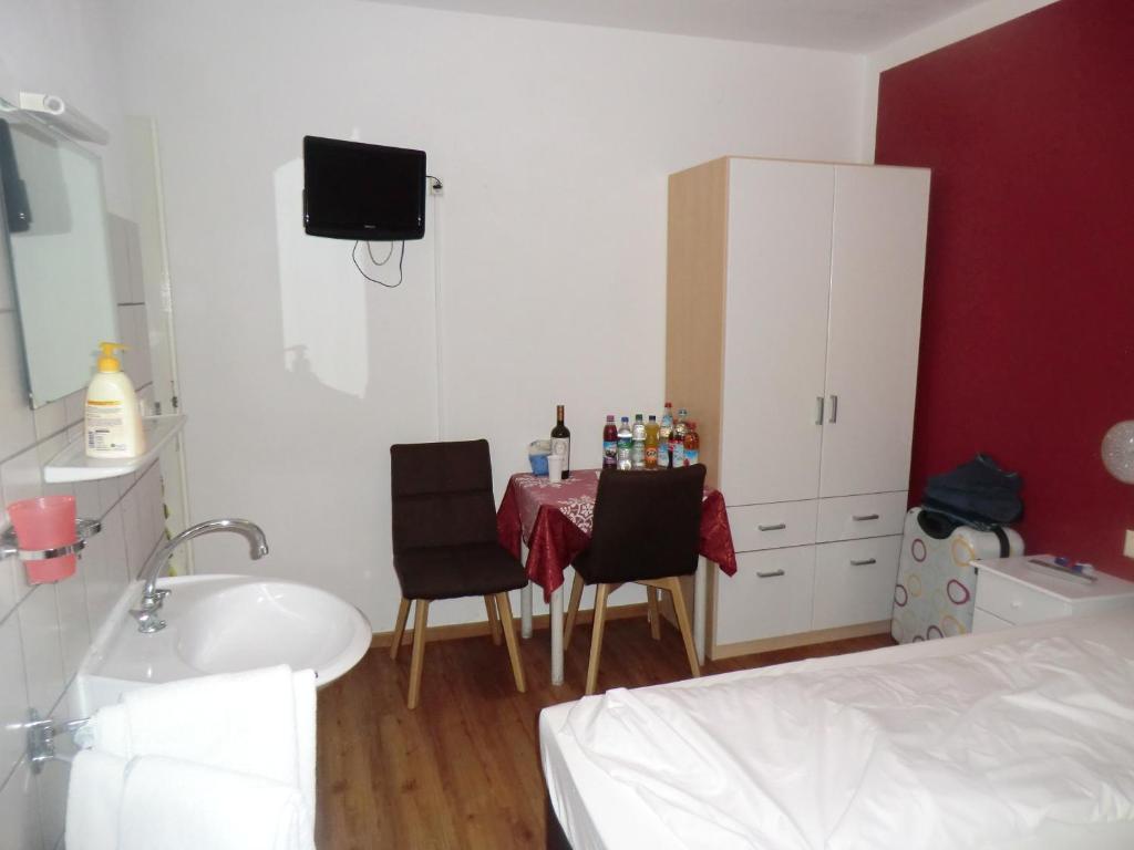Postel nebo postele na pokoji v ubytování Hotel Pension Haydn