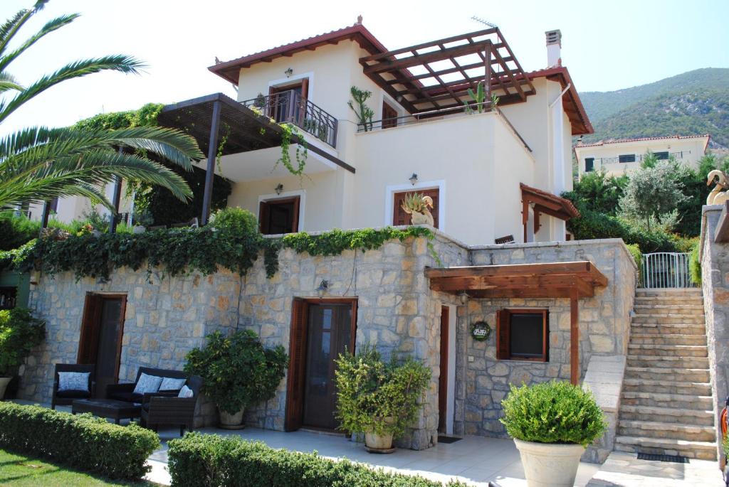 a villa with a view of the house at Villa Thea in Ancient Epidauros