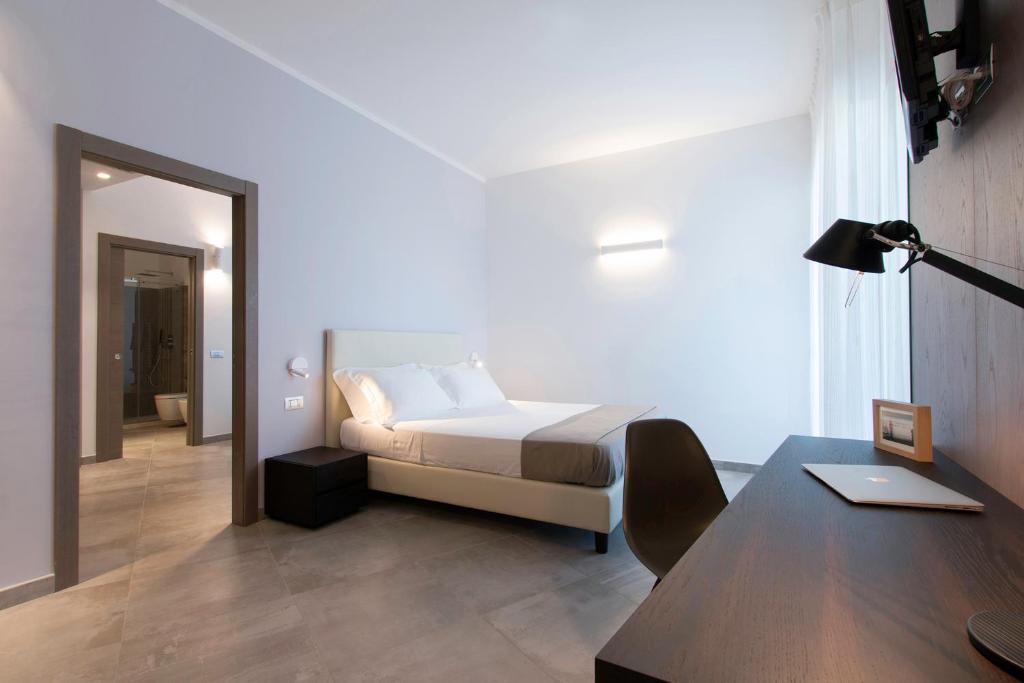 Postel nebo postele na pokoji v ubytování Hotel Eden