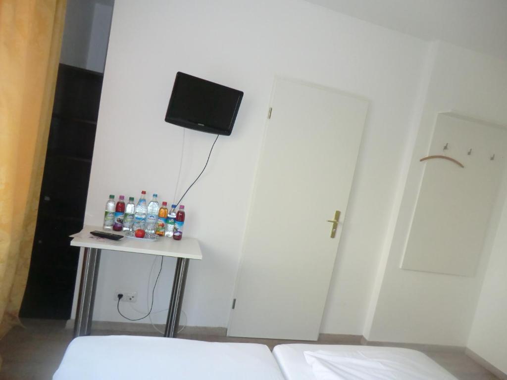 Postel nebo postele na pokoji v ubytování Hotel Pension Haydn