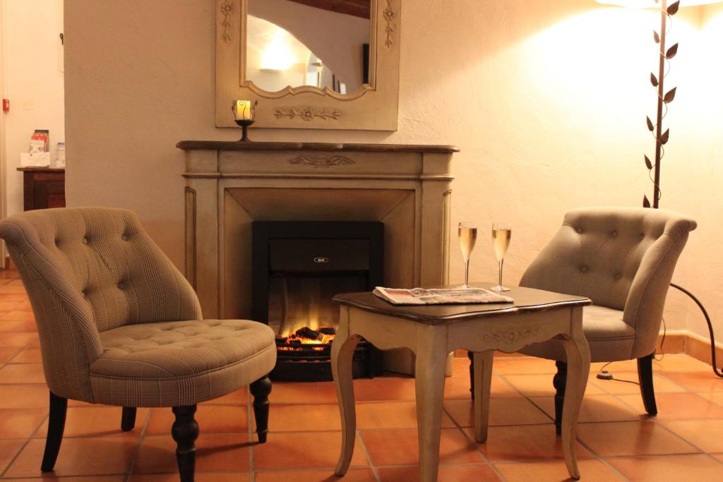 Posezení v ubytování Hotel Mas De Cure Bourse