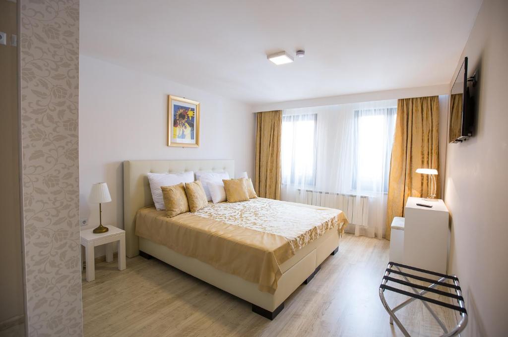 Krevet ili kreveti u jedinici u okviru objekta Heartland City B&B