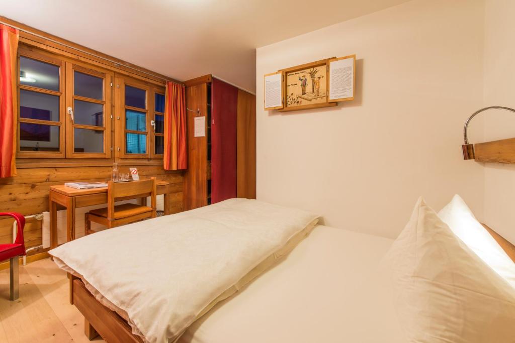 Postel nebo postele na pokoji v ubytování Hotel Glocke