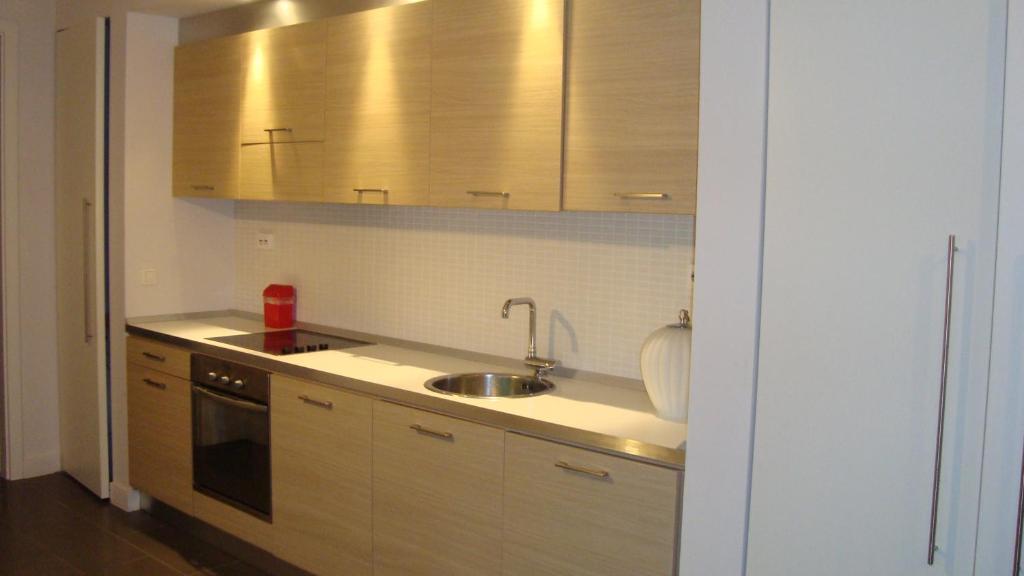 A cozinha ou cozinha compacta de YOO Apartment South Beach