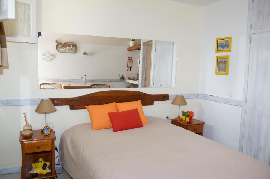 Säng eller sängar i ett rum på 16 Porto Santo Apartments