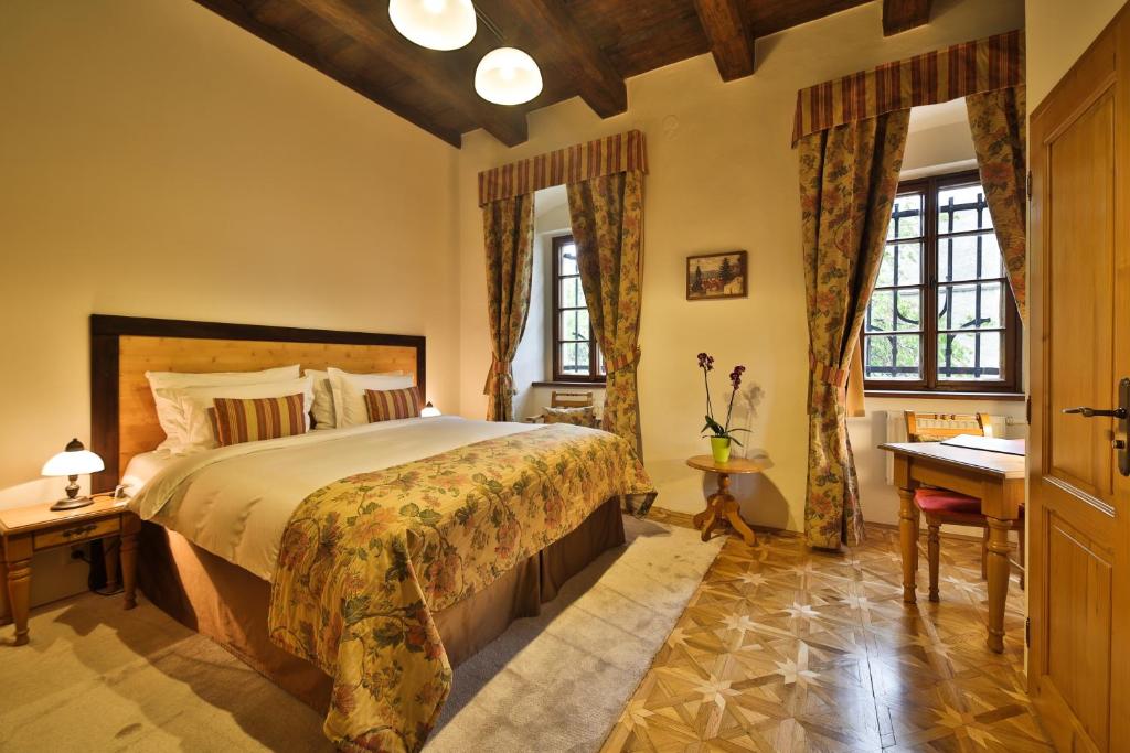 Postel nebo postele na pokoji v ubytování Questenberg Hotel