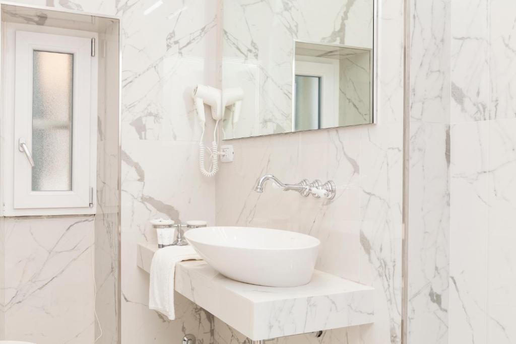 Łazienka w obiekcie Margherita Suites