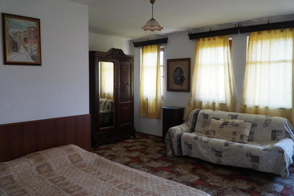 Postel nebo postele na pokoji v ubytování Guestrooms Ross