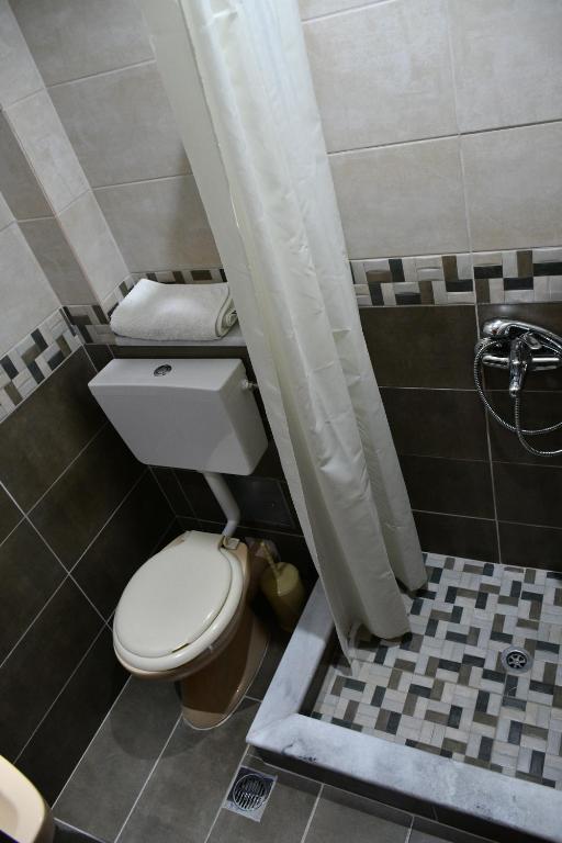 Koupelna v ubytování Hotel Hercules