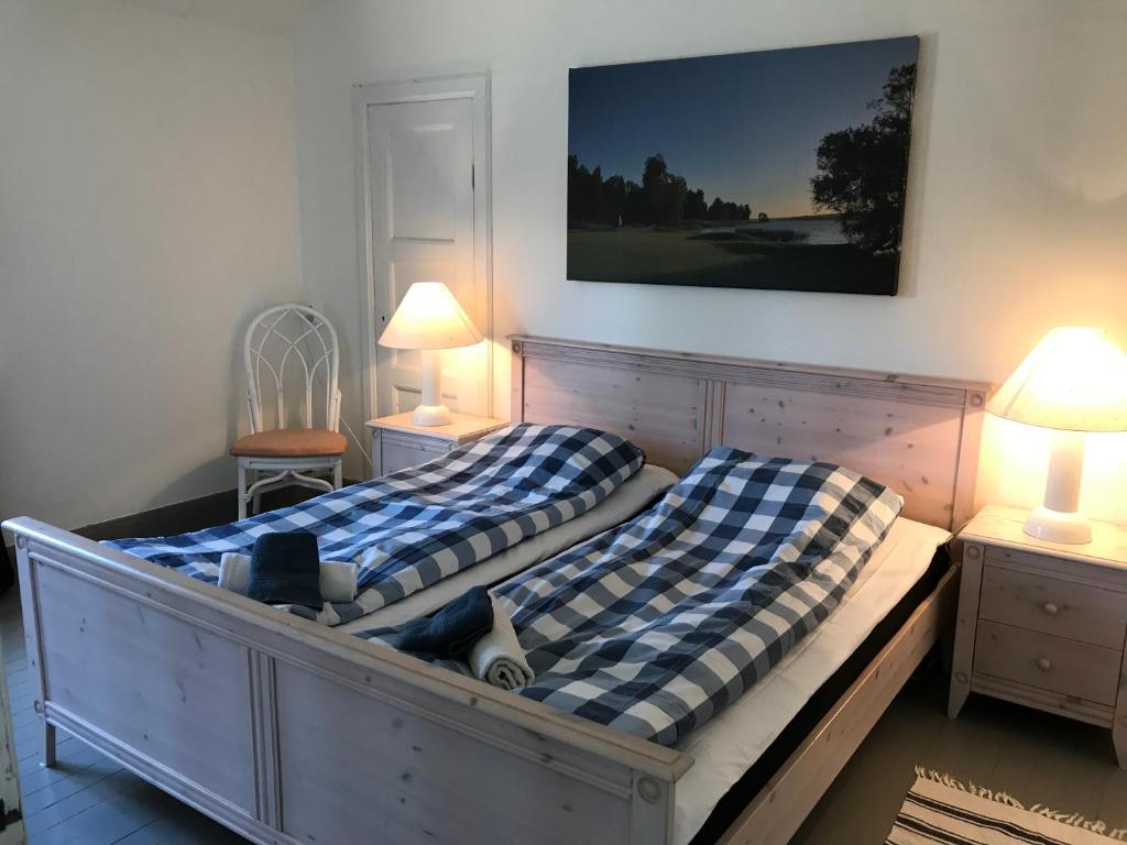 Postel nebo postele na pokoji v ubytování Hallandsgården by Mellbystrands