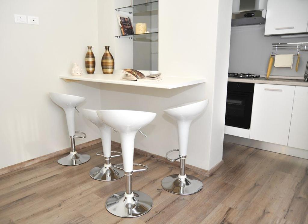 A kitchen or kitchenette at Casa Vacanze Centro Fiere