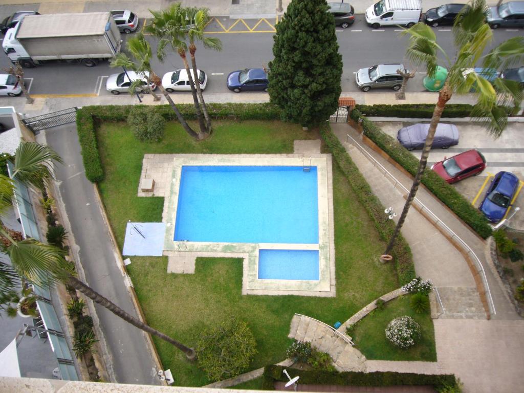 an aerial view of a yard with a swimming pool at Eden Park - Fincas Arena in Benidorm