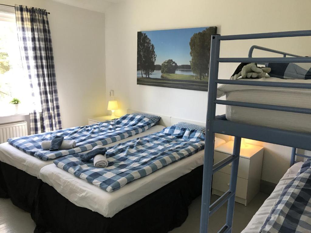 Postel nebo postele na pokoji v ubytování Hallandsgården by Mellbystrands