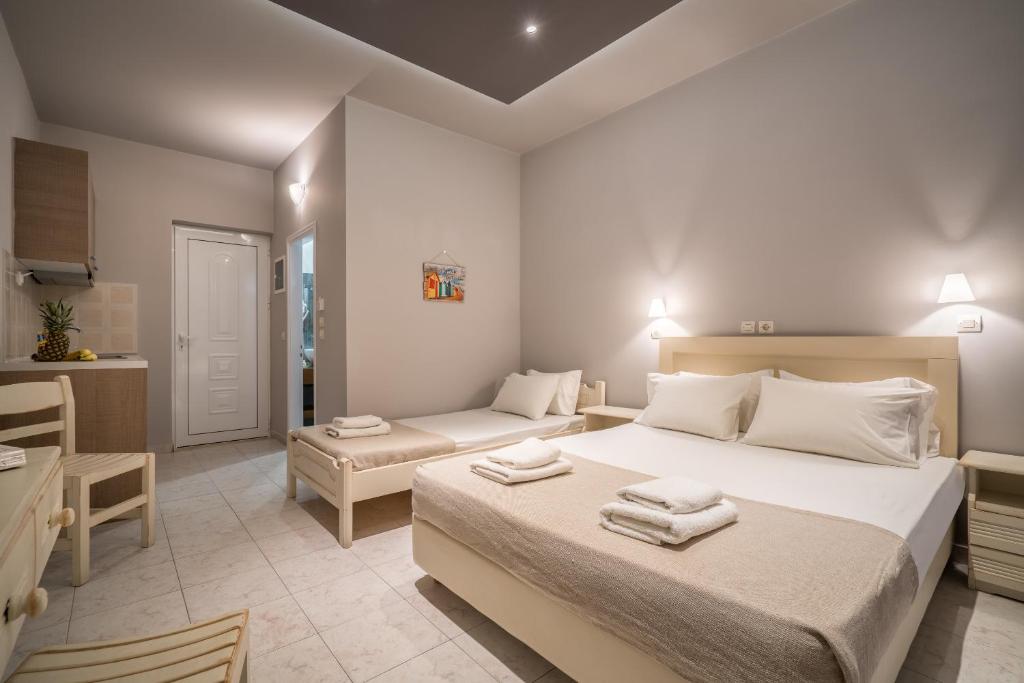 Postel nebo postele na pokoji v ubytování Armonia Boutique Hotel