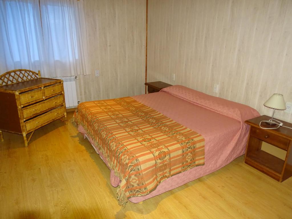 Postel nebo postele na pokoji v ubytování Hostel de Las Manos