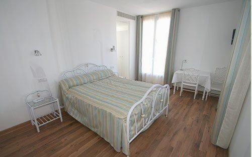 Postel nebo postele na pokoji v ubytování Hotel Lafon - face à l'Océan