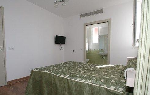 Postel nebo postele na pokoji v ubytování Hotel Lafon - face à l'Océan