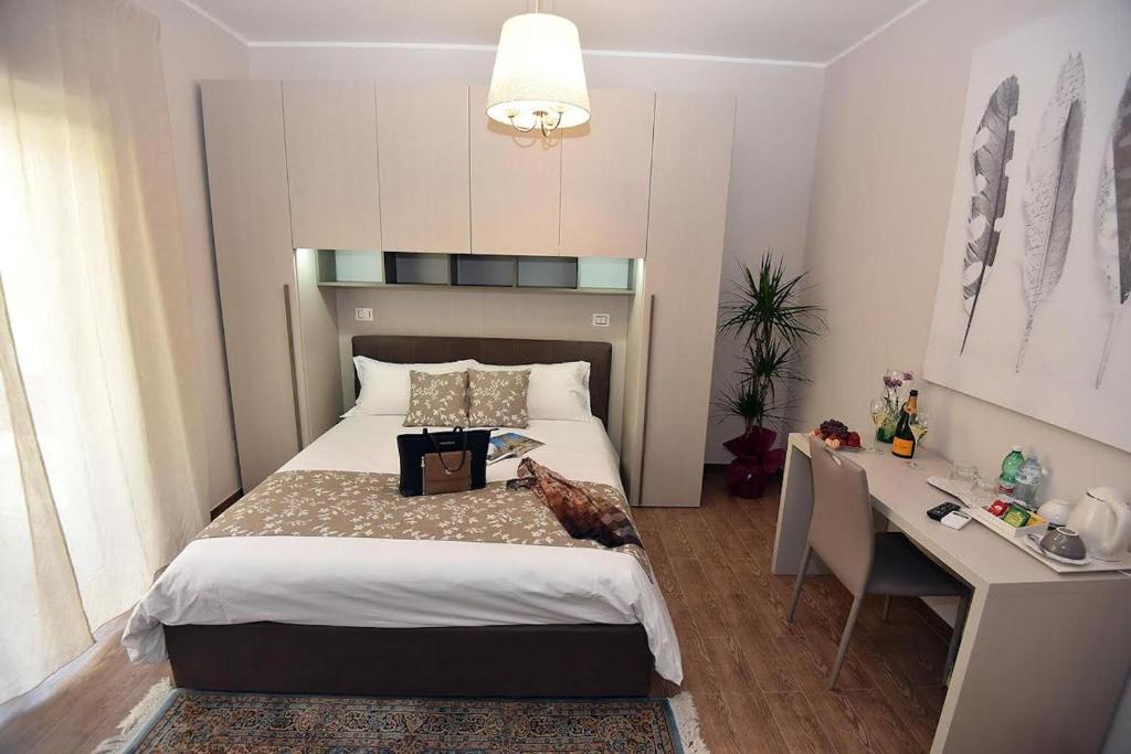 Postel nebo postele na pokoji v ubytování B&B Paradiso Relais