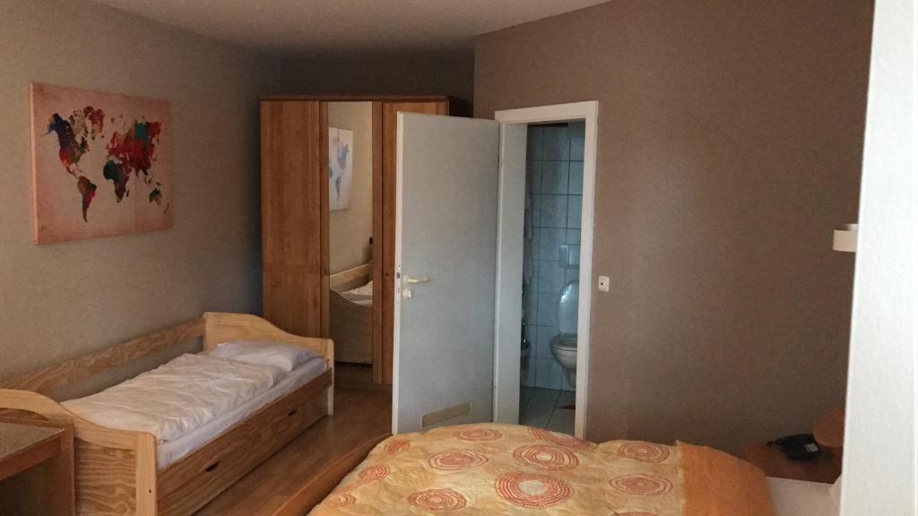 Postel nebo postele na pokoji v ubytování Hotel Korfu