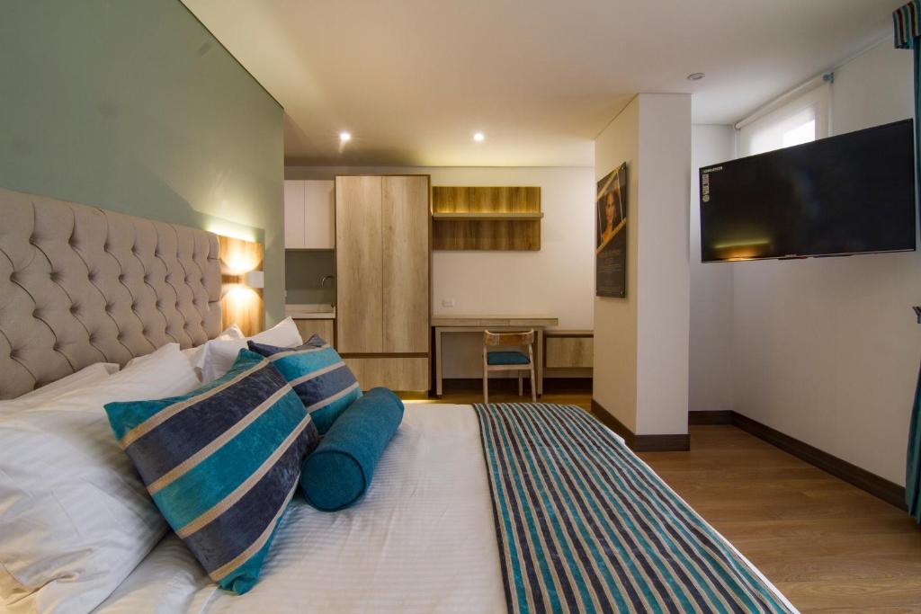 TV a/nebo společenská místnost v ubytování De Película Hotel