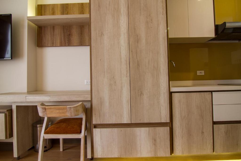 Kuchyň nebo kuchyňský kout v ubytování De Película Hotel