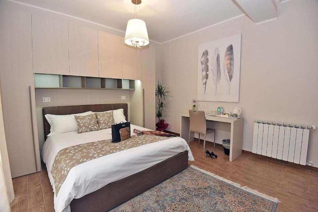 Postel nebo postele na pokoji v ubytování B&B Paradiso Relais