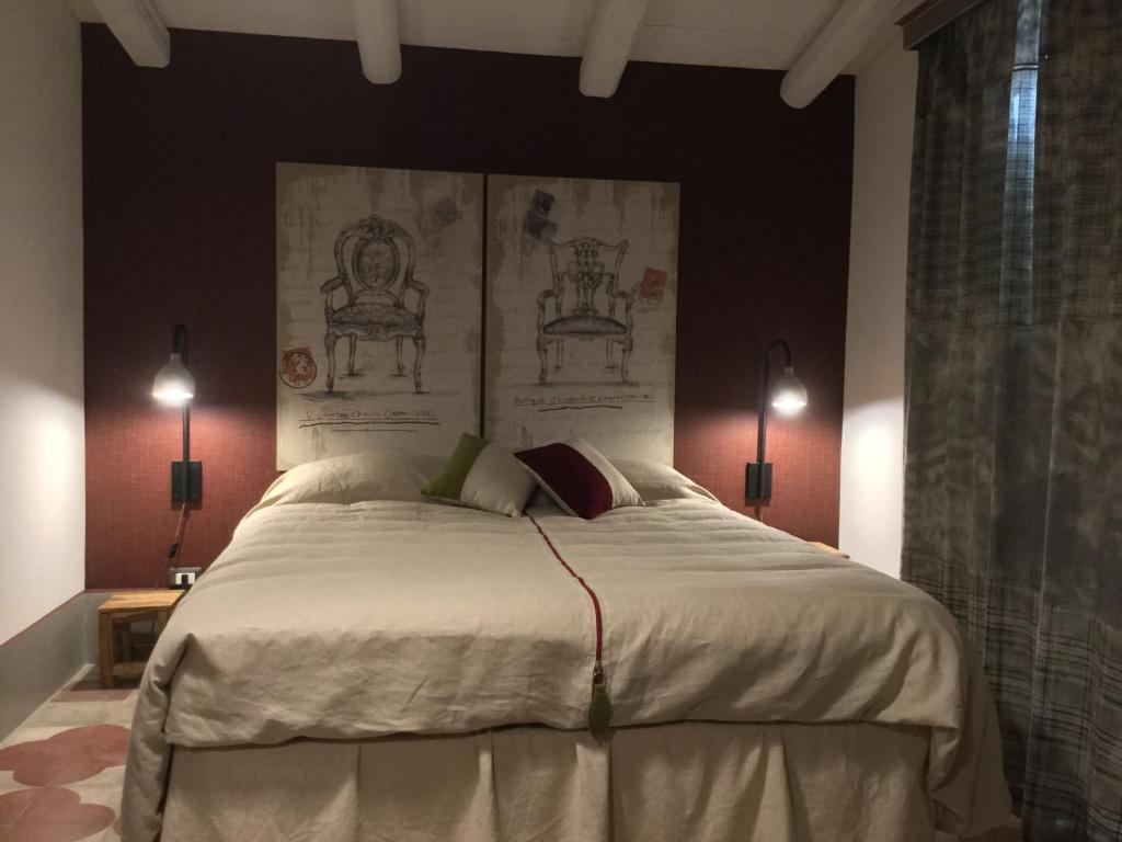Łóżko lub łóżka w pokoju w obiekcie Casa 28