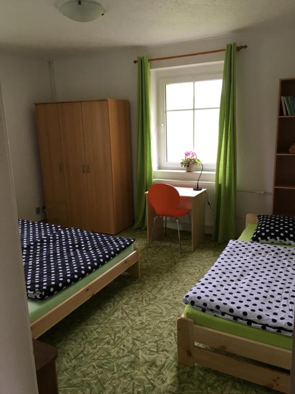 Postel nebo postele na pokoji v ubytování Apartments Mirror