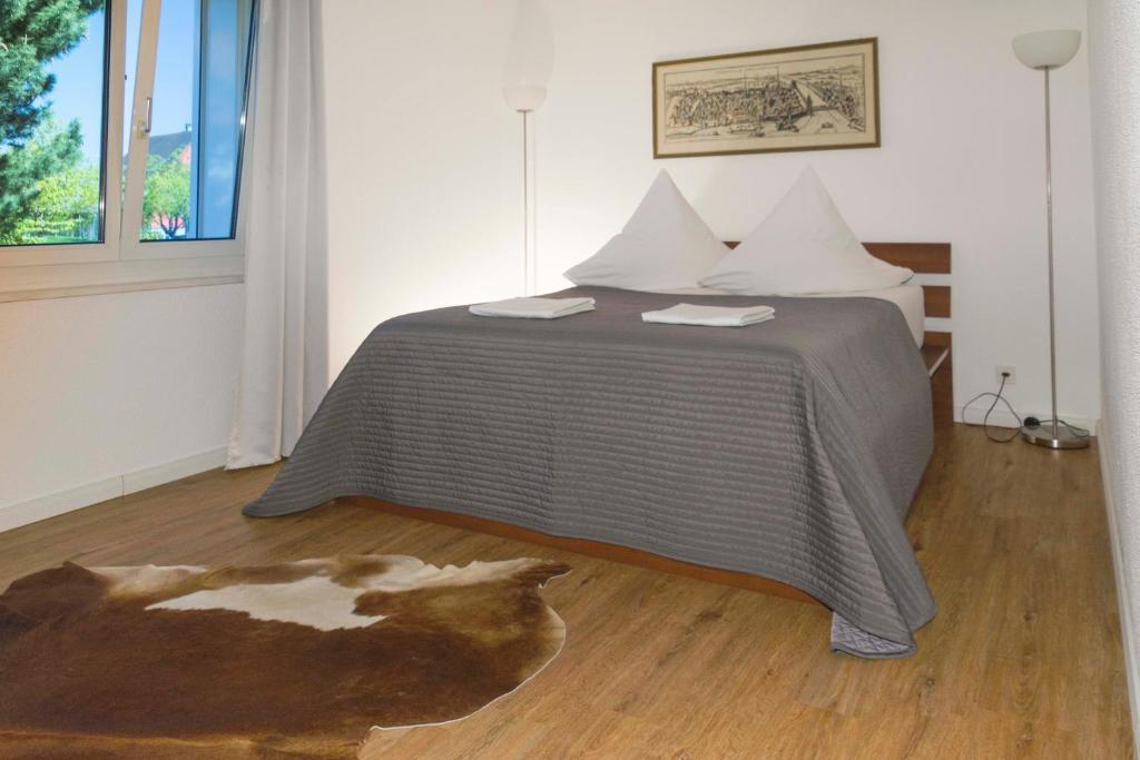 Postel nebo postele na pokoji v ubytování Konstanz nähe, ruhiges 4-Zim-Wohnung bis 8 Personen