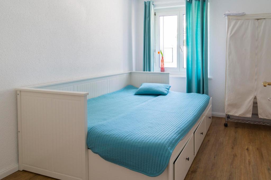 Postel nebo postele na pokoji v ubytování Konstanz nähe, ruhiges 4-Zim-Wohnung bis 8 Personen