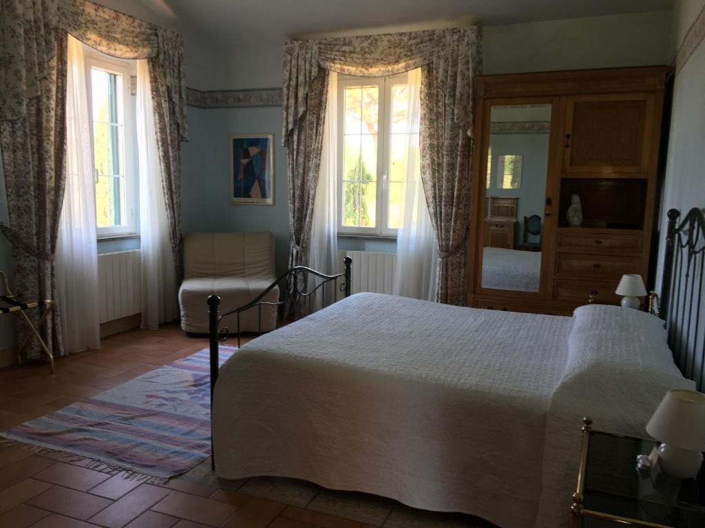 Postel nebo postele na pokoji v ubytování Podere Il Mulino