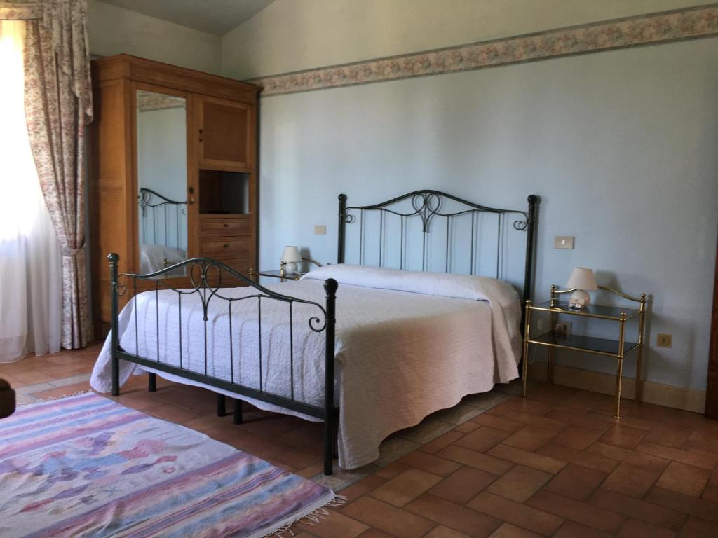 Postel nebo postele na pokoji v ubytování Podere Il Mulino