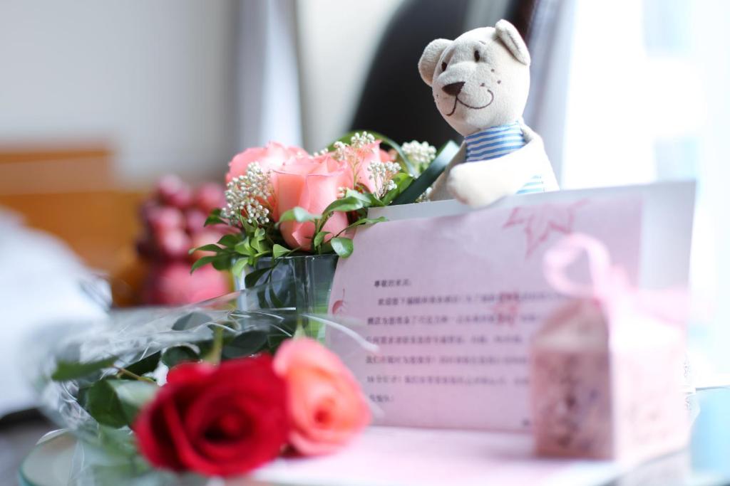 Domácí mazlíčci ubytovaní s hosty v ubytování Yihe Hotel Ouzhuang