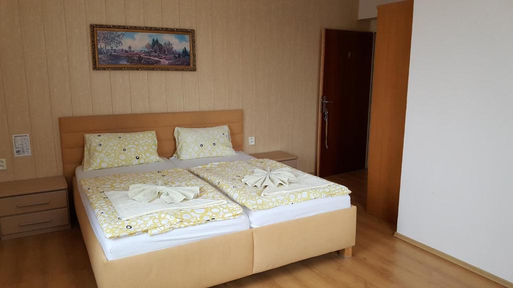 Postel nebo postele na pokoji v ubytování Pension U Dubu