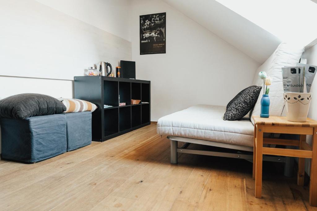 Postel nebo postele na pokoji v ubytování Layer Residences