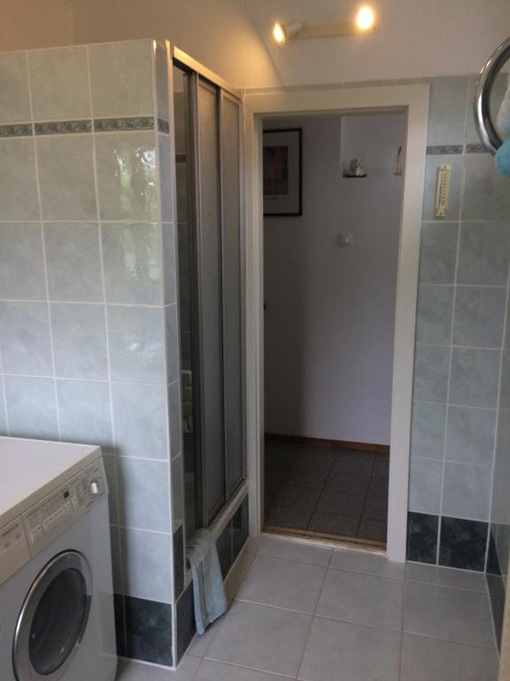 A bathroom at Appartements-Ella