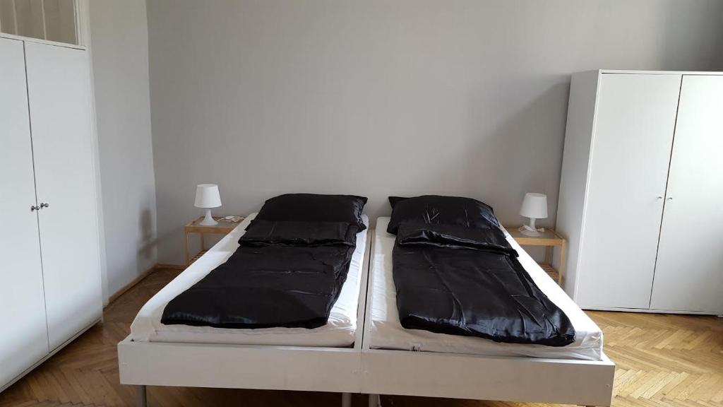 Posteľ alebo postele v izbe v ubytovaní Hello Tourist Flat