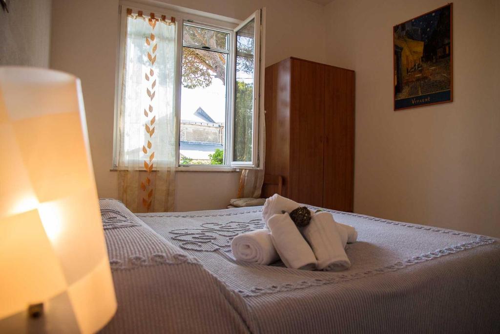 Postel nebo postele na pokoji v ubytování Hotel Silvia Framura - Cinque Terre