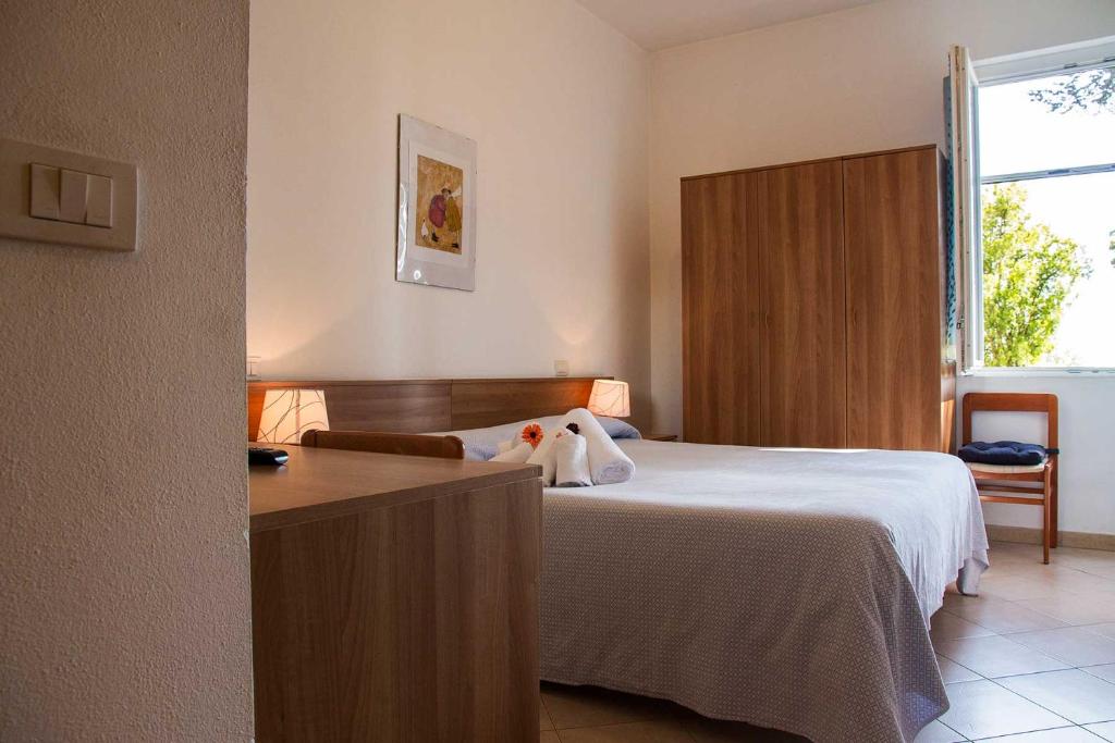 Postel nebo postele na pokoji v ubytování Hotel Silvia Framura - Cinque Terre