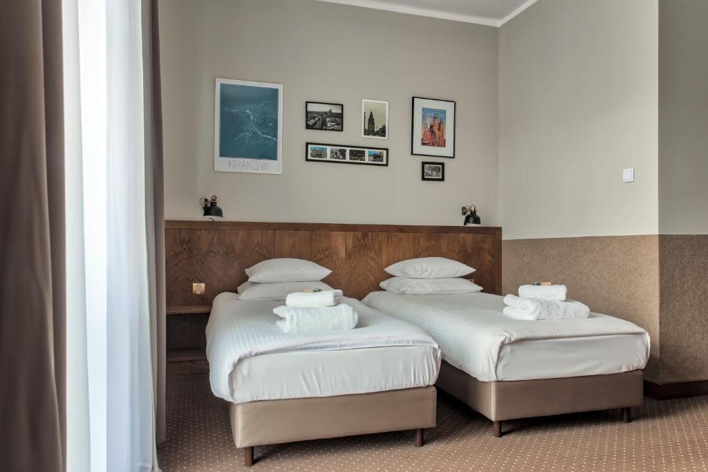 Posteľ alebo postele v izbe v ubytovaní Daniel Griffin Aparthotel by Artery Hotels