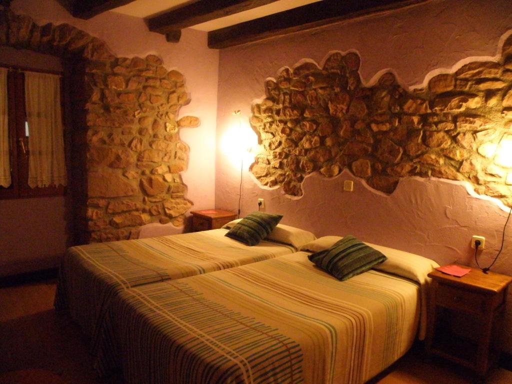 Postel nebo postele na pokoji v ubytování Posada Elbete
