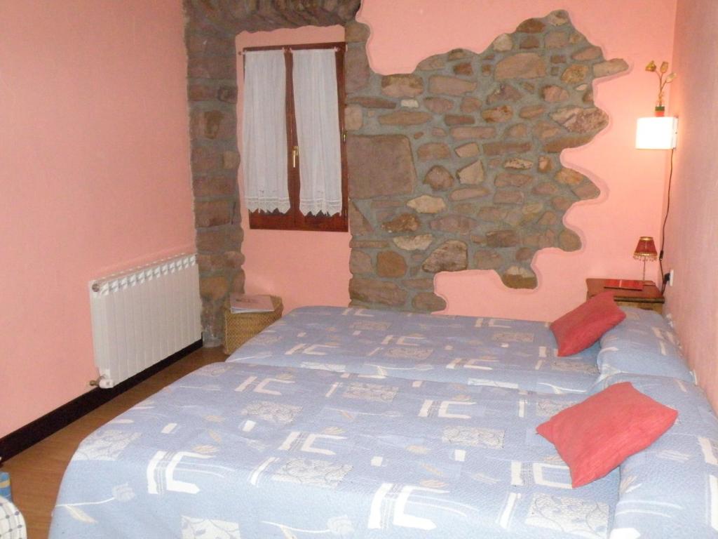 Postel nebo postele na pokoji v ubytování Posada Elbete