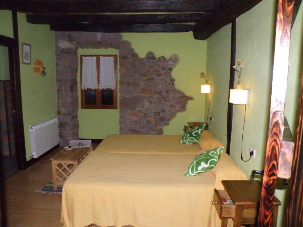 Postel nebo postele na pokoji v ubytování Posada Elbete