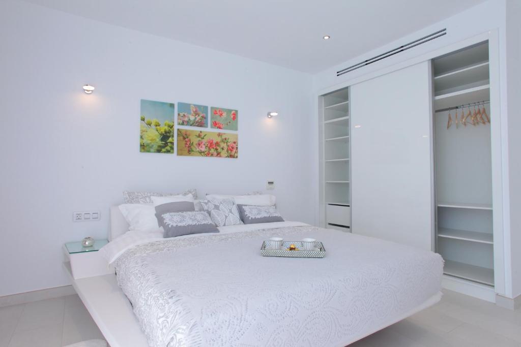 Postel nebo postele na pokoji v ubytování Villas Flamingo Resort